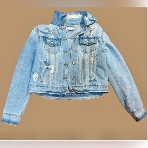 Ripped, distressed denim jacket